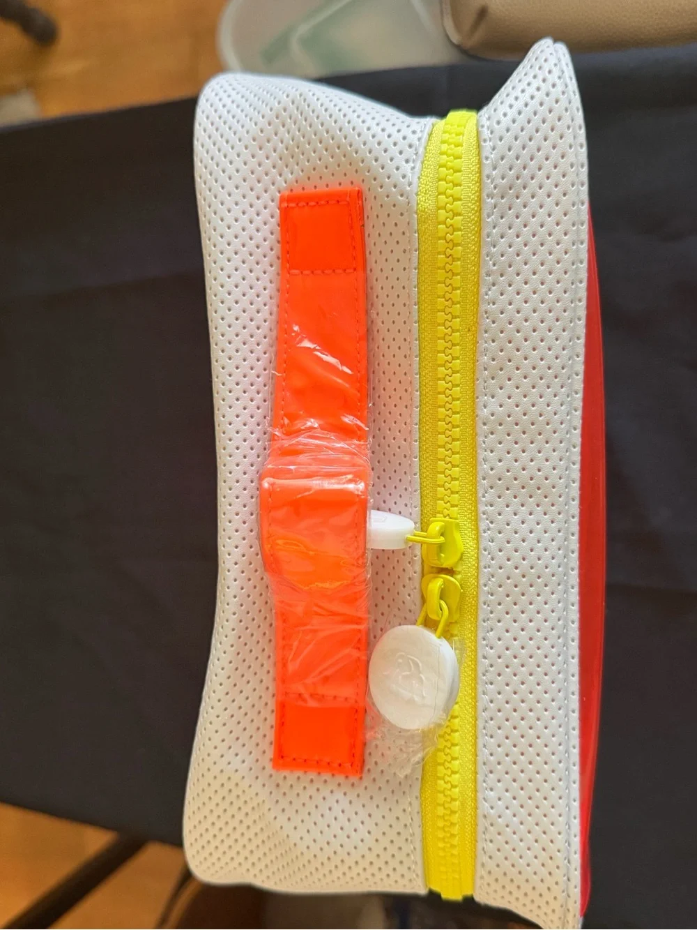 Drunk Elephant Perforated white makeup Bag with Orange Accent new without tags